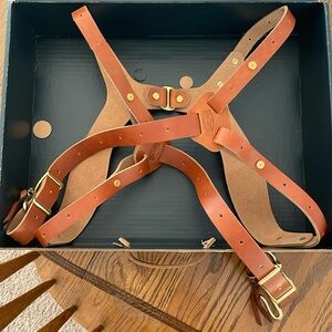 Brand new Rose Anvil camera harness with original box.